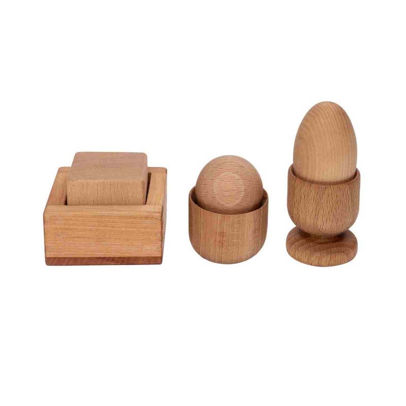 1. Montessori Egg, Ball, and Square set by Wooden Story showing wooden egg, ball, and square in holders on a white background
