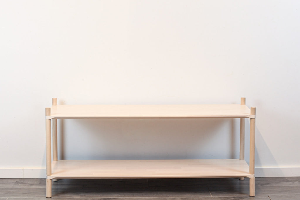 3. Front view of Montessori-inspired wooden shelving unit with two shelves, showcasing minimalist design and rounded corners
