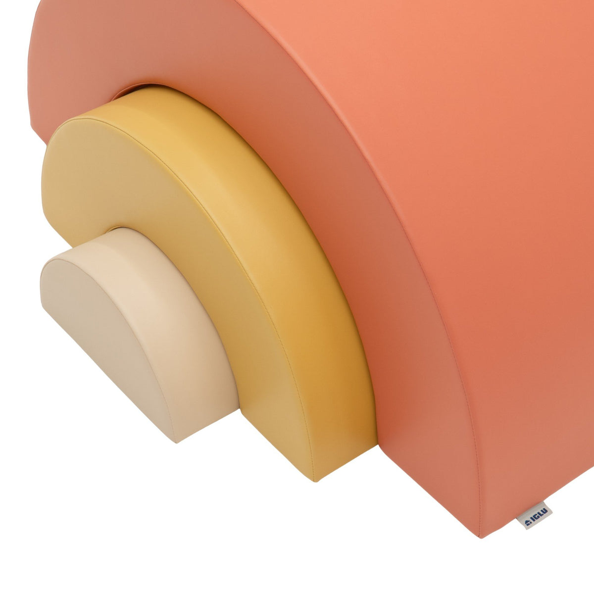 3. Close-up of Montessori soft play set showing pastel pink, yellow, and beige foam pieces with IGLU logo