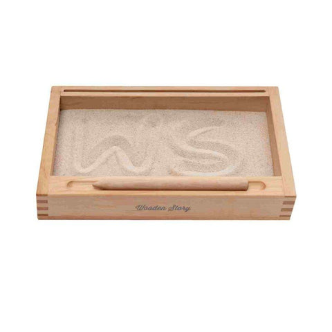 4. Wooden Montessori sand writing tray with 'WS' letters drawn in sand, by Wooden Story