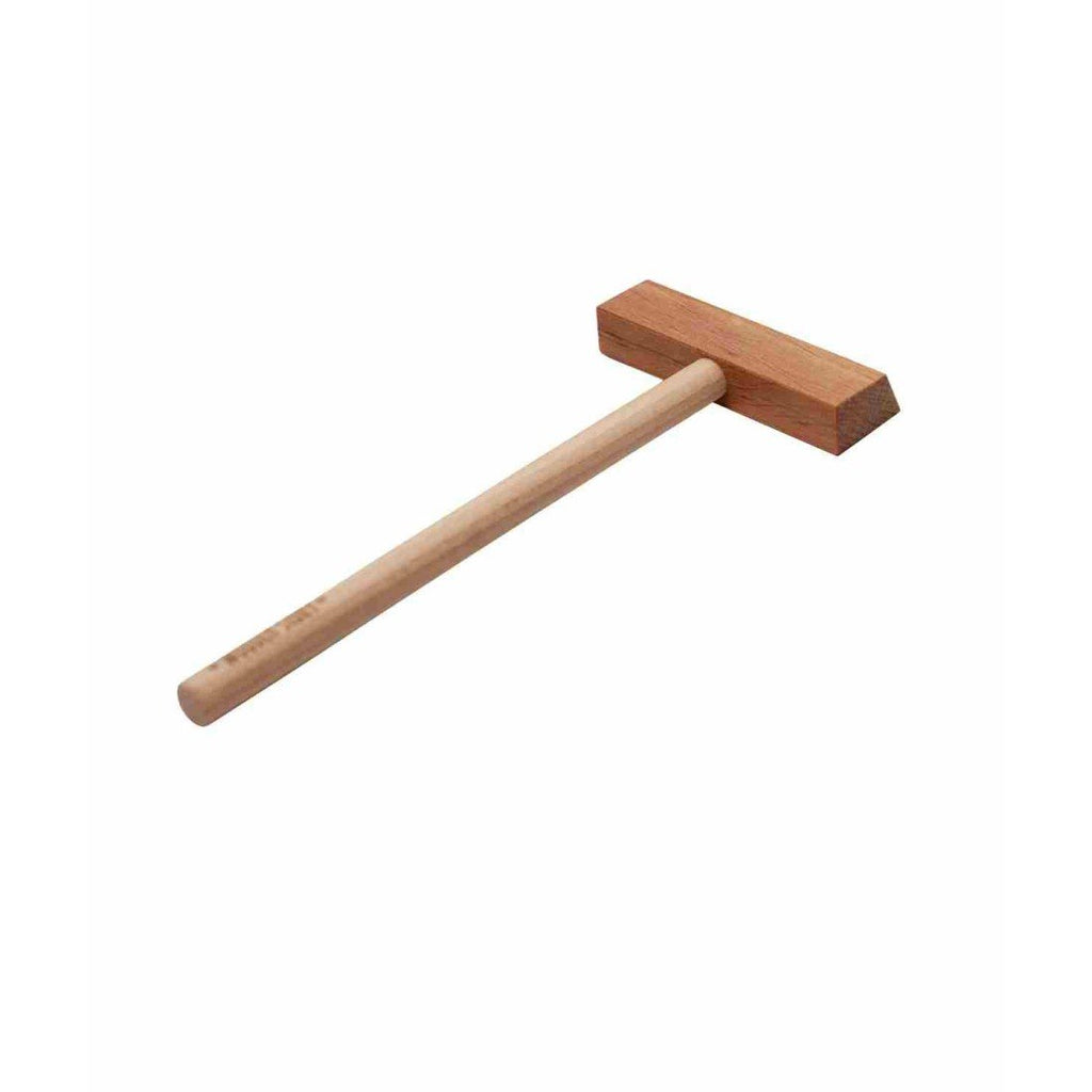 3. Angled view of Montessori wooden accessory with a rectangular head and smooth finish, on a white background