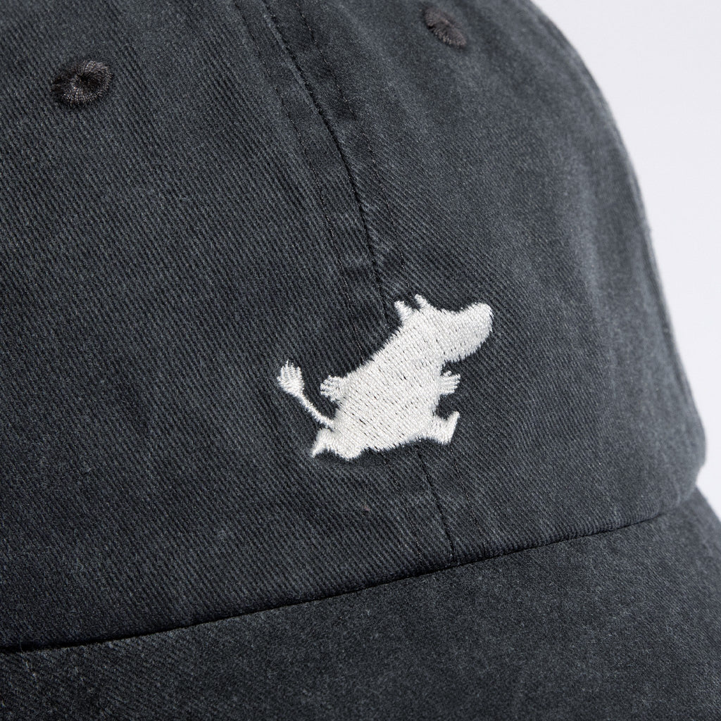 3. Close-up of Moomin Classics Denim Dad Cap in dark grey, highlighting embroidered Moomin logo