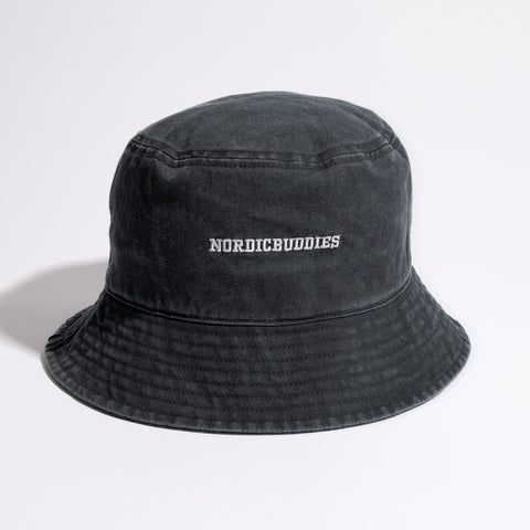 5. Studio image of black washed denim bucket hat with NordicBuddies logo