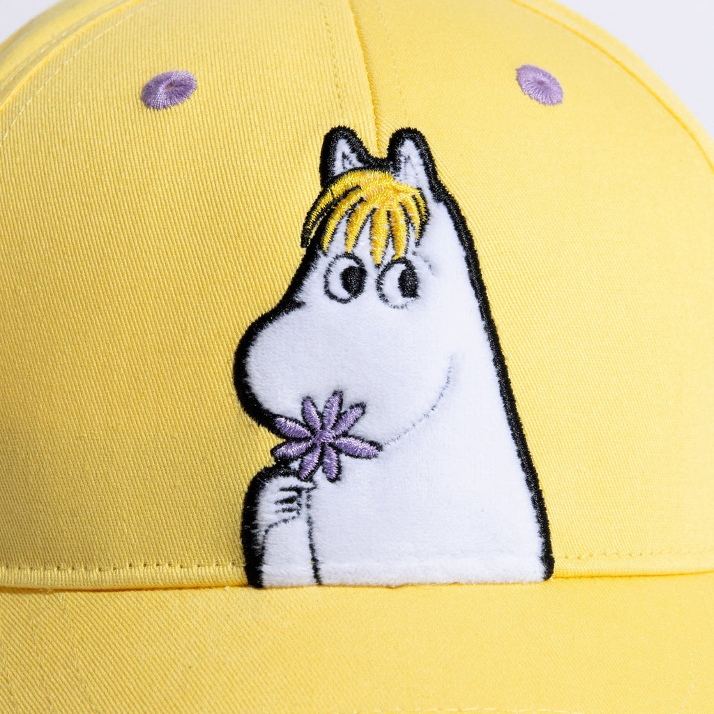 3. Close-up of Moomin Snorkmaiden embroidery on yellow kids cap, highlighting character detail