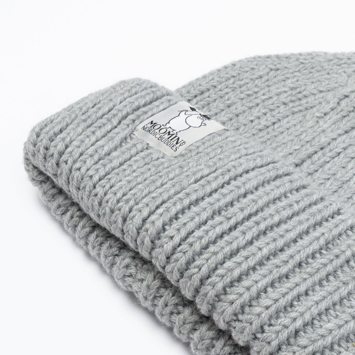 3. Close-up of grey Moominpappa chunky beanie showing ribbed texture and Moomin by NordicBuddies logo on brim