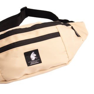 3. Close-up of Moominpappa beige waist bag by NordicBuddies, highlighting front zipper pocket and logo