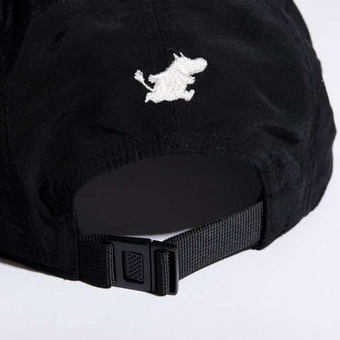 5. Close-up of adjustable strap and Moomintroll embroidery on black 5-panel cap