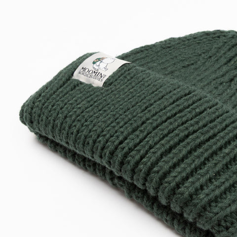 3. Close-up of green Moomintroll chunky beanie by NordicBuddies showing ribbed texture and logo patch