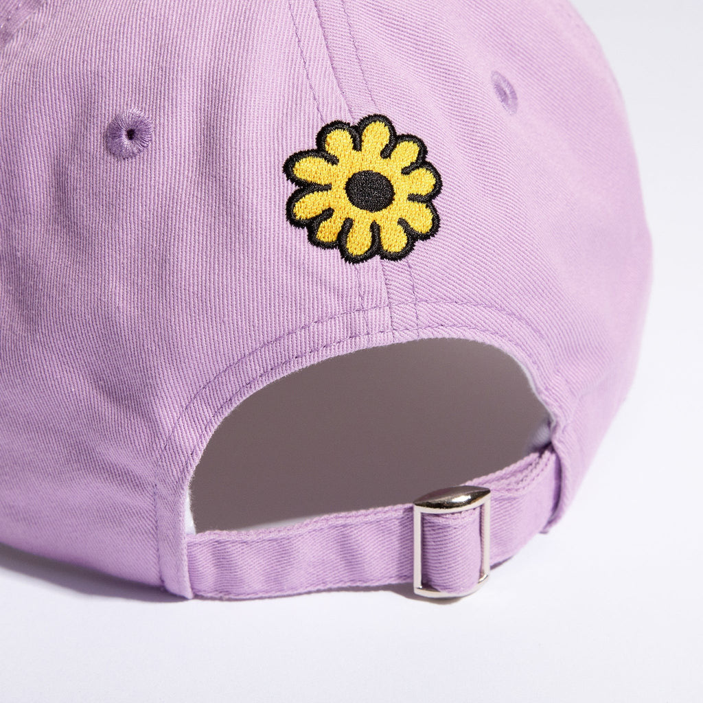 5. Close-up of flower embroidery and adjustable strap on lavender Moomintroll Dad Cap