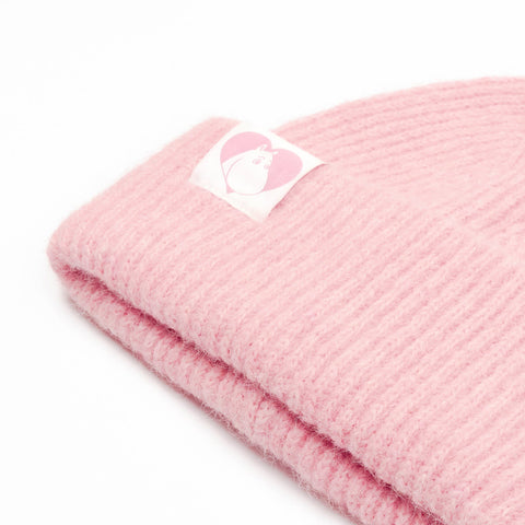 3. Close-up of pink ribbed beanie with Moomin character patch