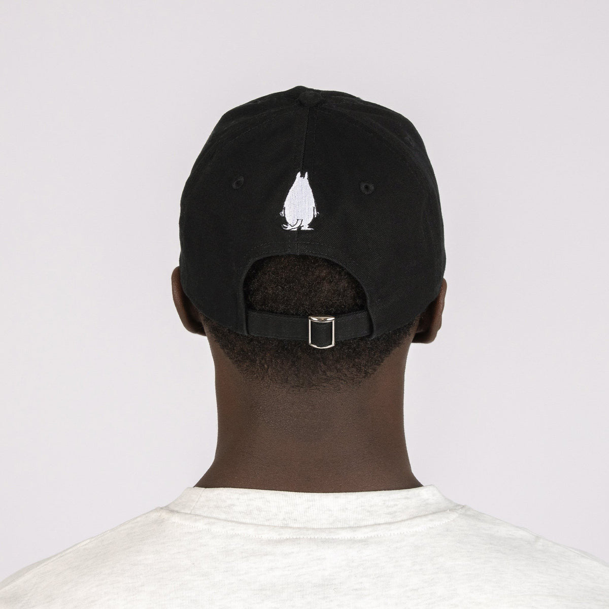 2. Back view of Moomin by NordicBuddies black dad cap with adjustable strap and Moomintroll embroidery
