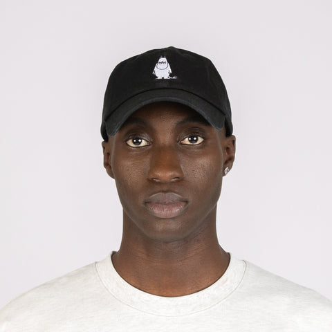 4. Male model wearing Moomin by NordicBuddies black dad cap with Moomintroll embroidery, front view