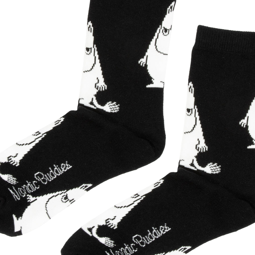 2. Close-up of Moomin by NordicBuddies black Moomintroll Grumpy men's socks highlighting white character pattern and logo