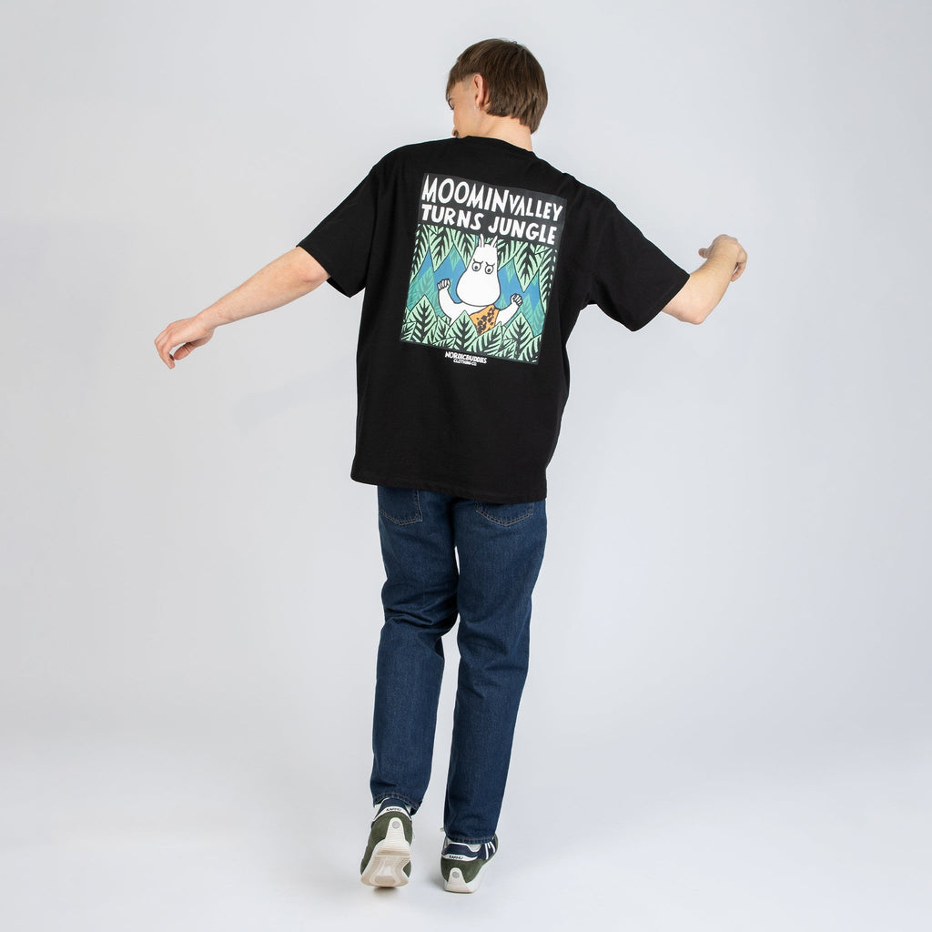 2. Women's black Moomintroll Jungle t-shirt with front logo, styled casually in studio