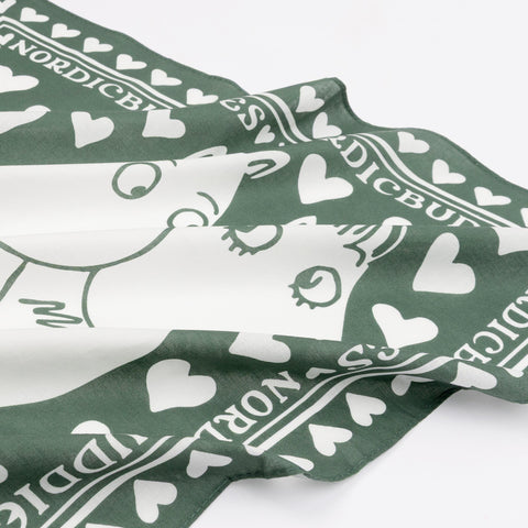 2. Close-up of green cotton scarf showing Moomintroll and Snorkmaiden design with heart pattern and NordicBuddies branding