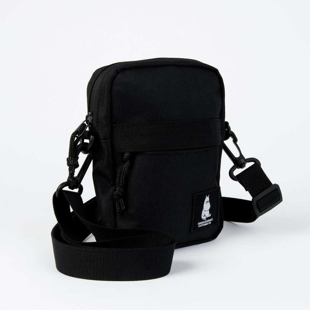 4. Black Moomin by NordicBuddies cross body bag angled view showing side strap and Moomin logo on white background