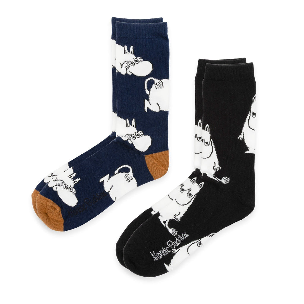 3. Two pairs of socks, one navy with brown toe and one black, featuring white Moomintroll pattern and NordicBuddies logo