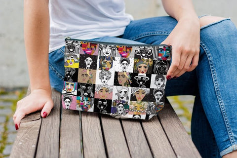 1. Women's colorful mosaic makeup bag by Garbanota, held by a model sitting on a bench, showcasing artistic design and practicality
