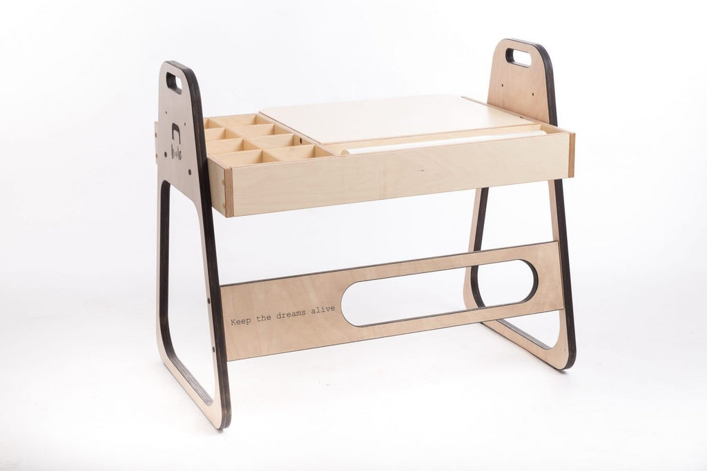 2. Luula Julle multisensory art table with birch finish and built-in storage compartments on a white background