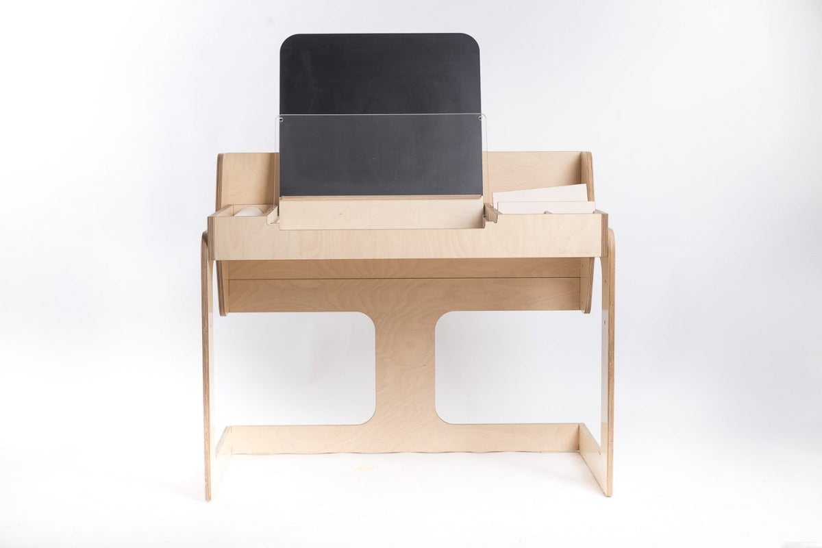 3. Studio shot of Luula art table with chalkboard and adjustable height feature, highlighting design and functionality