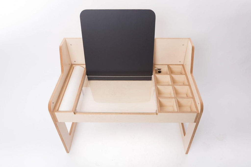 13. Studio shot of Luula table with chalkboard and storage, emphasizing minimalist design