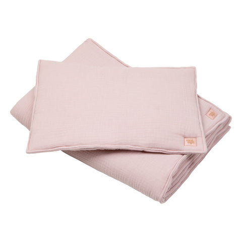 1. Baby pink muslin blanket and pillow set with sewn-in filling, shown folded on a white background, featuring Moi Mili brand tag