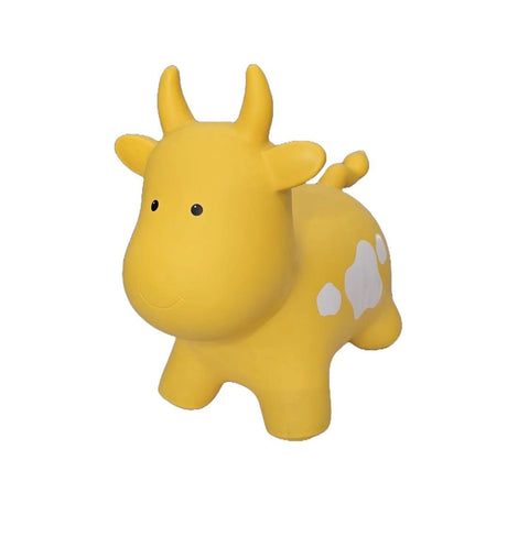 2. Yellow cow-shaped hopper toy by Gerardo's Toys with white spots, shown on a white background highlighting its playful design