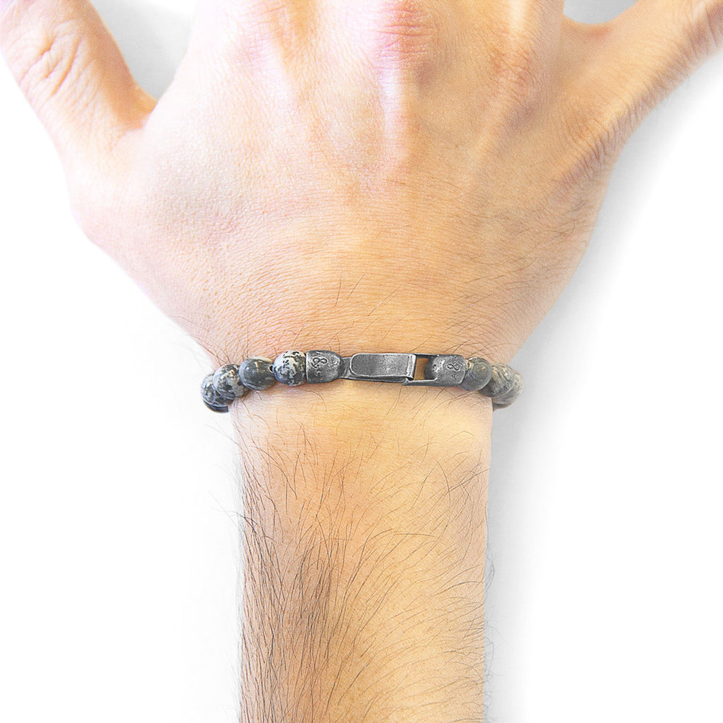 1. Men's Nachi Silver and Stone Beaded Bracelet in grey jasper worn on wrist, showcasing .925 sterling silver clasp