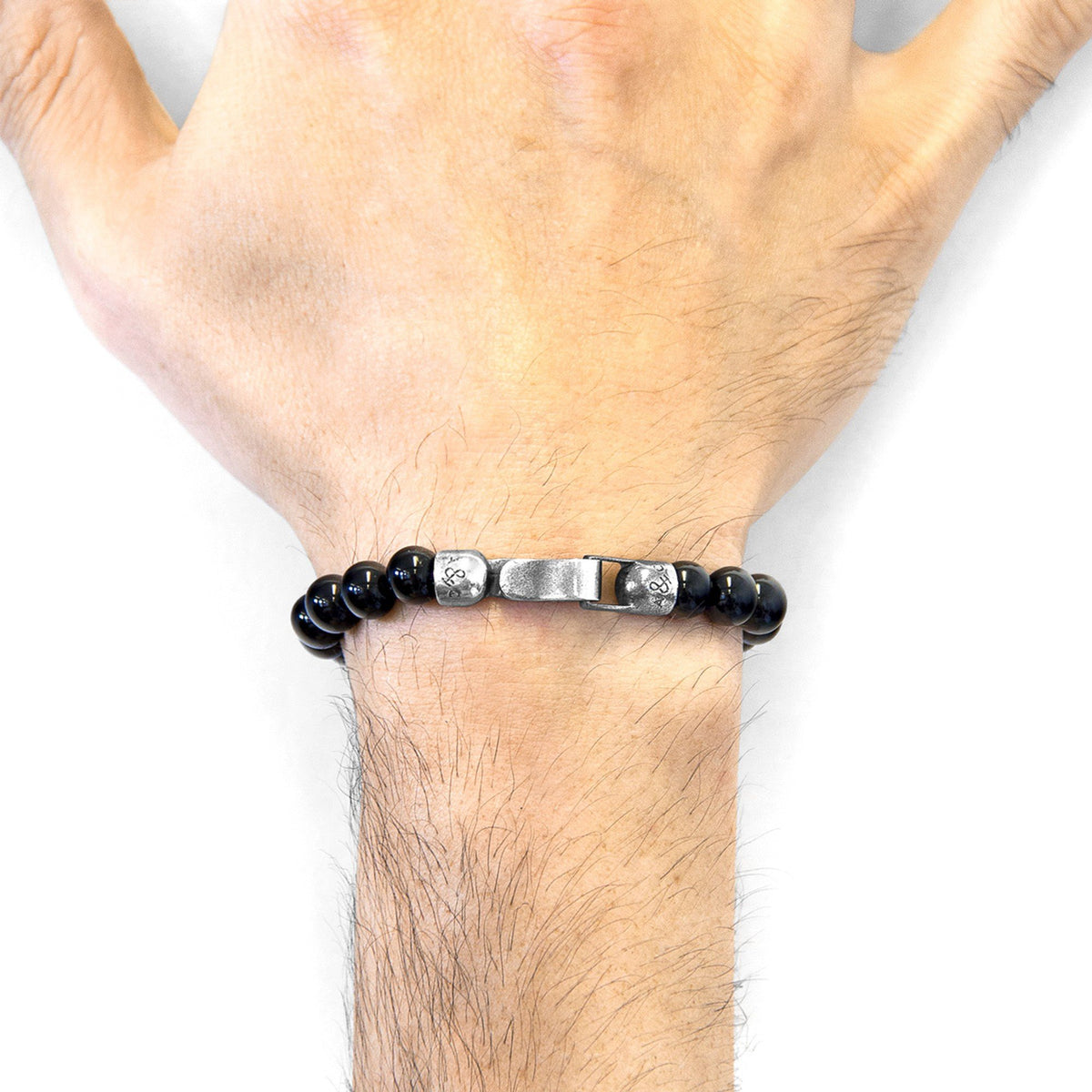 1. Men's Nachi Silver and Stone Beaded Bracelet with black onyx beads and sterling silver clasp by ANCHOR & CREW, worn on wrist
