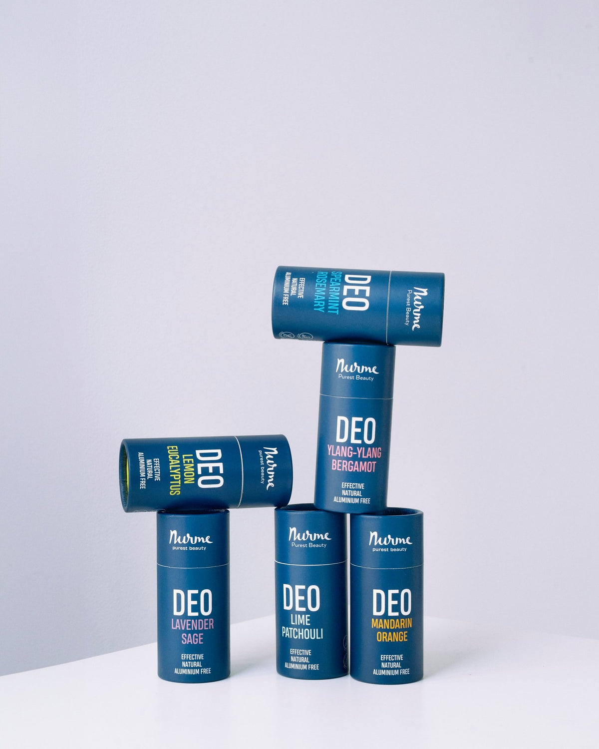 4. Collection of Nurme deodorants including Ylang-Ylang Bergamot and Mandarin Orange stacked creatively