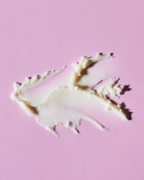 4. Close-up of smooth texture of Nurme natural deodorant on pink background