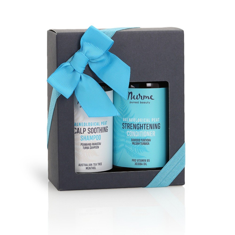 5. Nurme hair care gift set with scalp soothing shampoo and strengthening conditioner in a black box with a blue ribbon on a white background