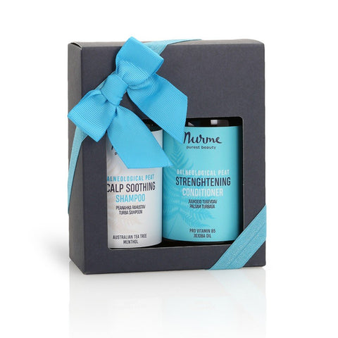5. Nurme hair care gift set with scalp soothing shampoo and strengthening conditioner in a black box with a blue ribbon on a white background