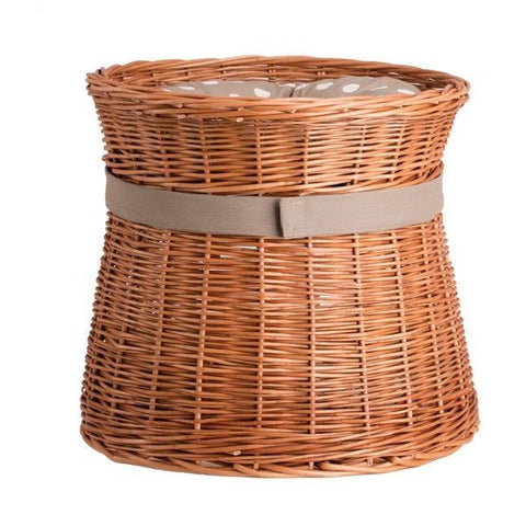 4. Back view of wicker cat house with polka dot cushion on top, highlighting the natural weave and stability.