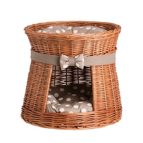 1. Natural wicker cat house with two levels and polka dot cushions, featuring a decorative bow, ideal for cats to nap and play.