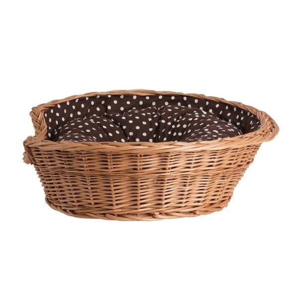 2. Oval wicker dog bed with brown polka dot cushion, studio shot
