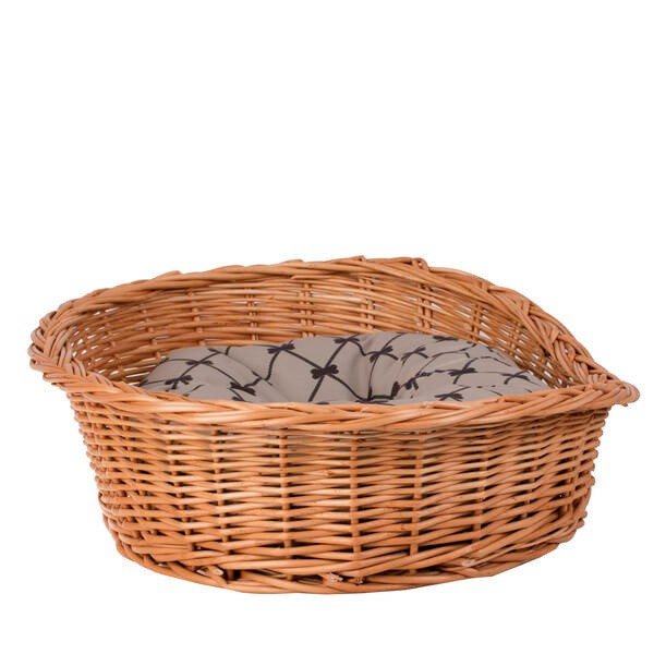 2. Side view of natural wicker dog bed with patterned beige cushion, highlighting woven texture