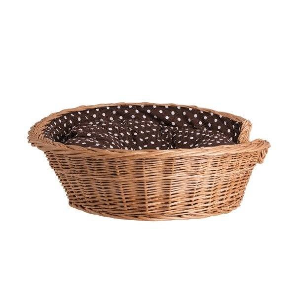 2. Oval wicker dog bed with brown polka dot cushion, studio shot