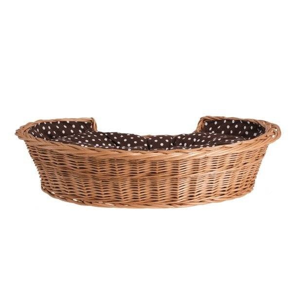 2. Oval wicker dog bed with brown polka dot cushion, studio shot