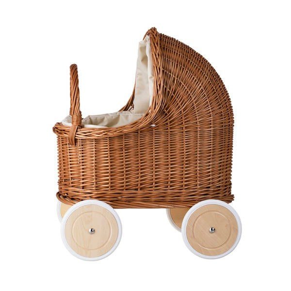8. Side profile of natural wicker doll pram with beige bedding and wooden wheels