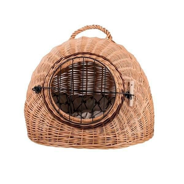 7. Front view of wicker pet carrier with closed metal grille and interior cushion visible
