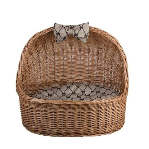 1. Front view of natural wicker pet house with decorative bow and patterned cushion, ideal for small pets