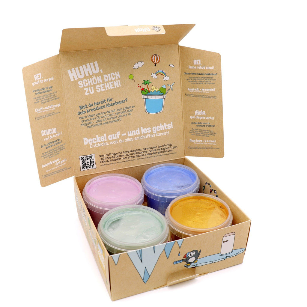 6. Open Neogrün finger paint box displaying Rose Quartz, Sapphire, Jade, and Gold paints with illustrated interior