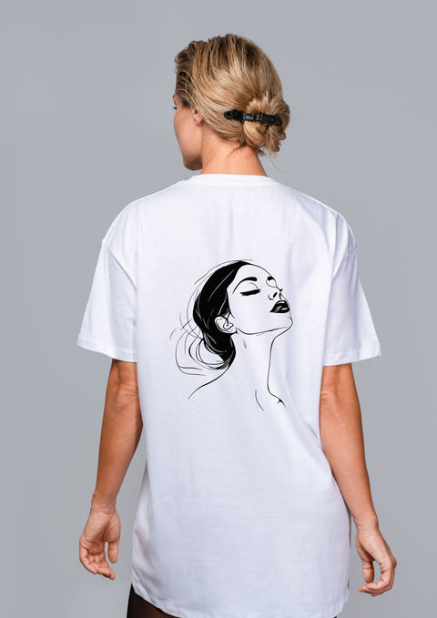 2. Woman shown from back wearing white T-shirt with black line art illustration on grey background