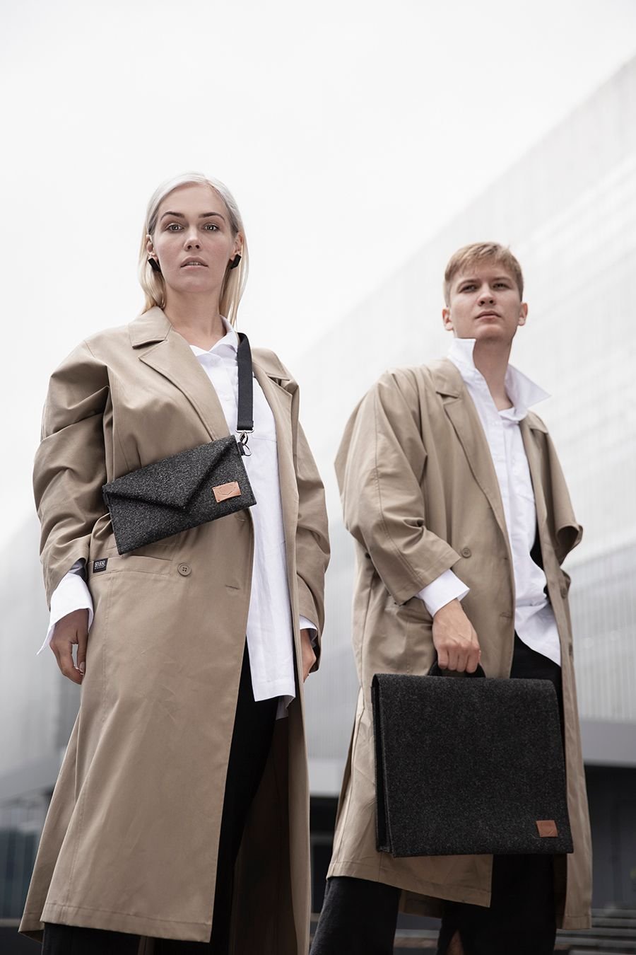1. Women's Skive-mini crossbody bag by Nordhale worn over shoulder, styled with beige trench coat in urban setting