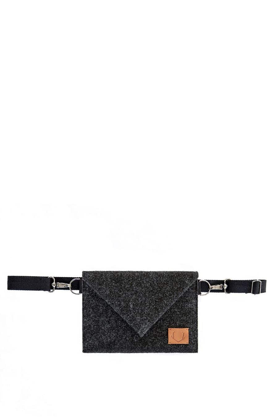 5. Studio image of Skive-mini crossbody bag by Nordhale with adjustable strap and envelope cut