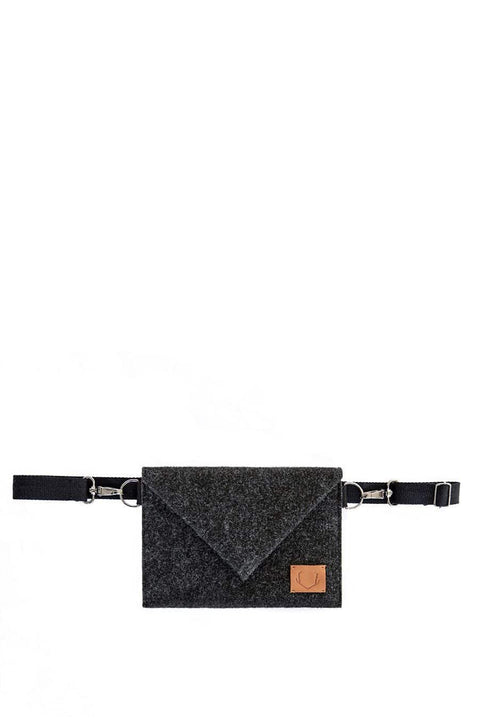 5. Studio image of Skive-mini crossbody bag by Nordhale with adjustable strap and envelope cut