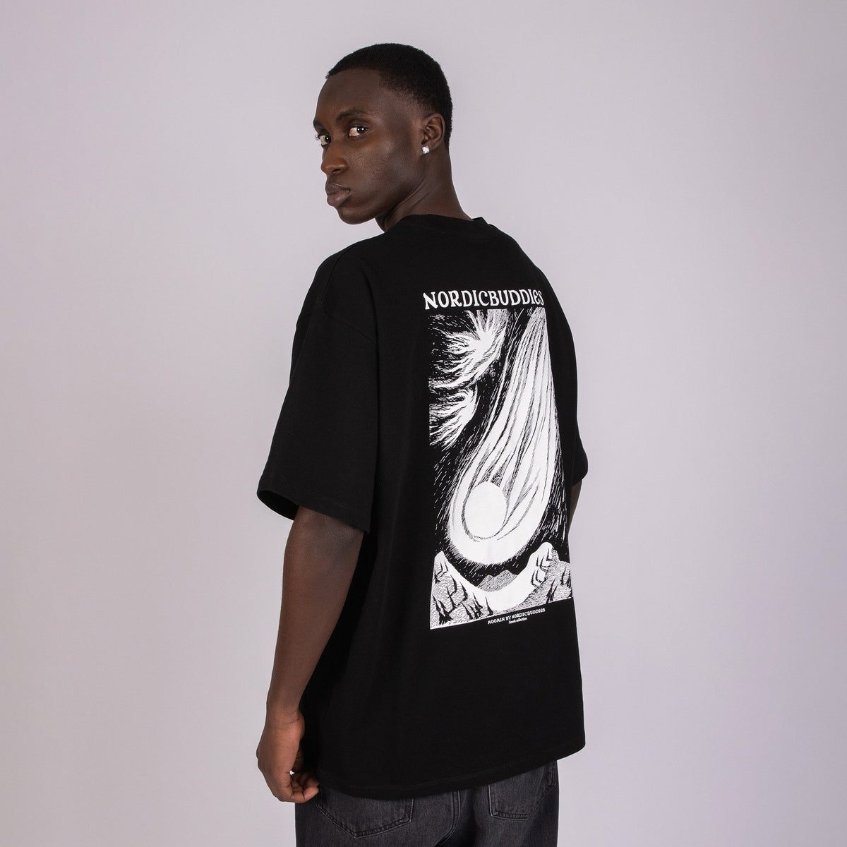 10. Size chart for Moomin unisex t-shirt, showing XS–XXL in cm with fit diagram