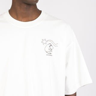 4. Close-up of male model wearing Moomin unisex t-shirt, highlighting front logo design