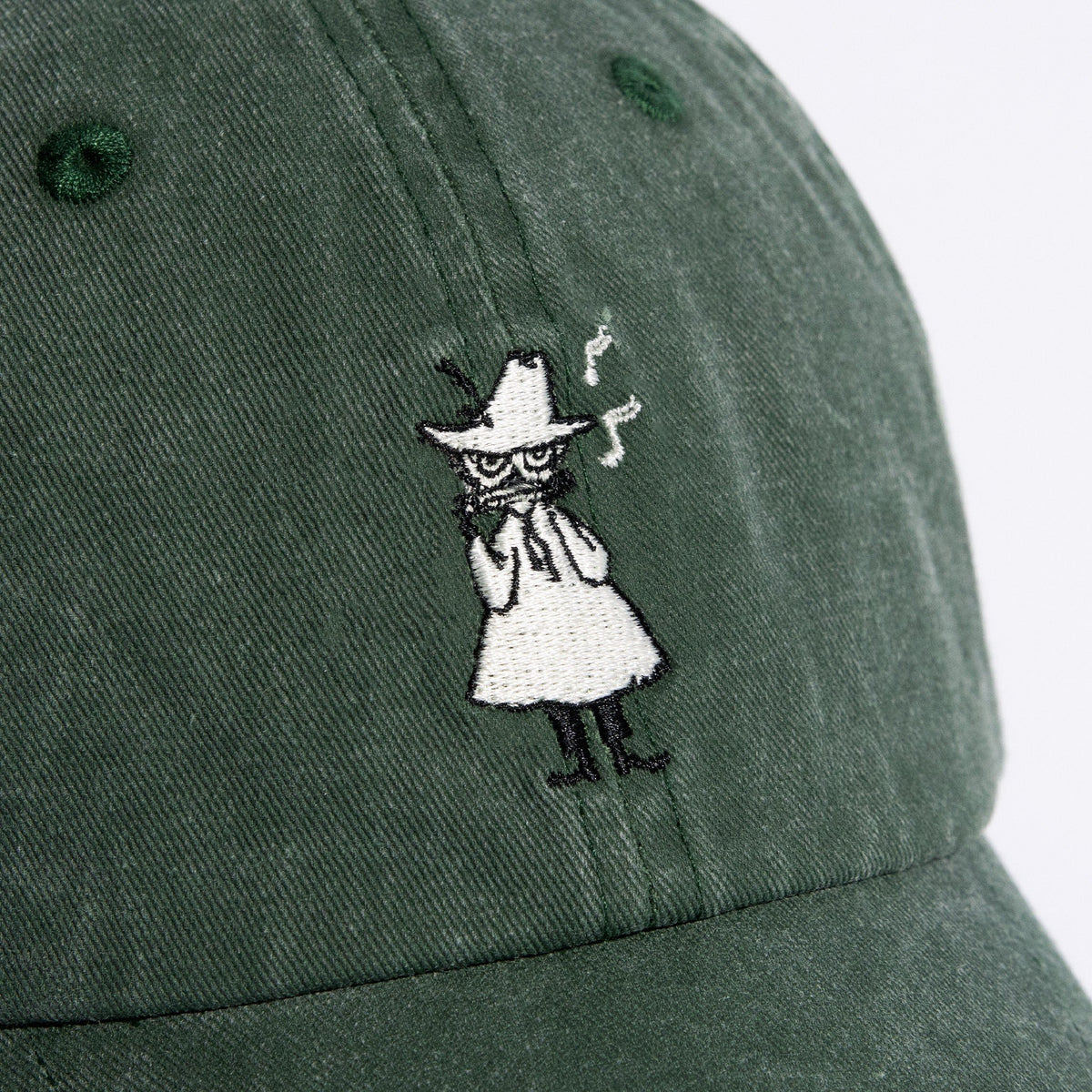 7. Detailed view of embroidered character on green Moomin washed denim cap
